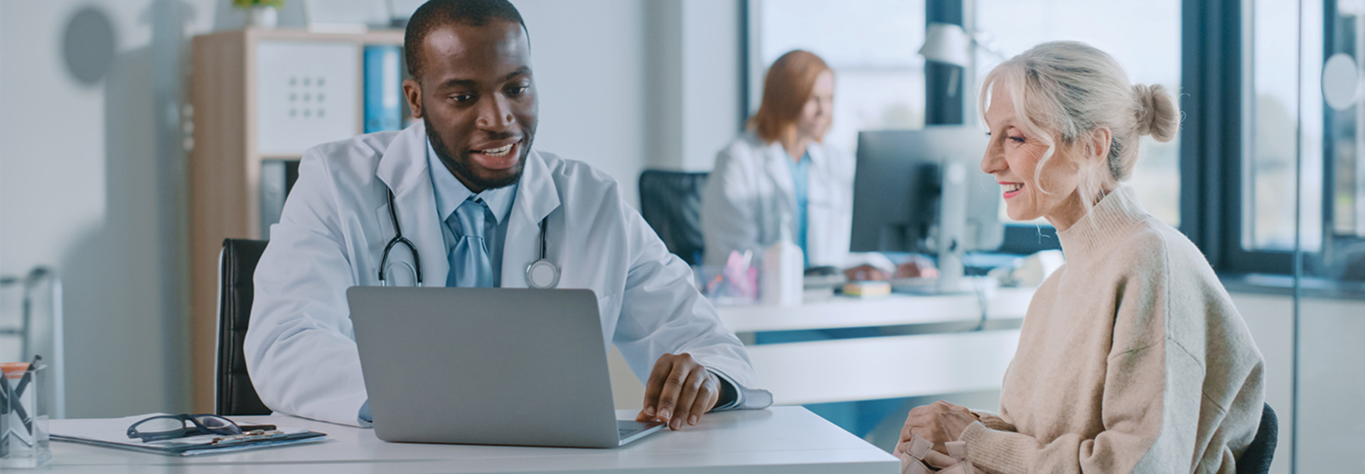 doctor discusses health history with patient