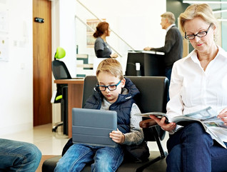 People in waiting room of a dental clinic