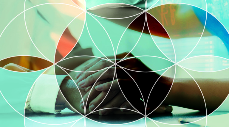 kaleidoscope effect on top of nurse holding patient's hand