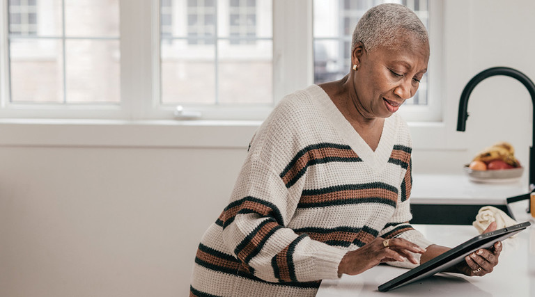 Older Adult on Tablet Device 