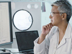 Two doctors reviewing data